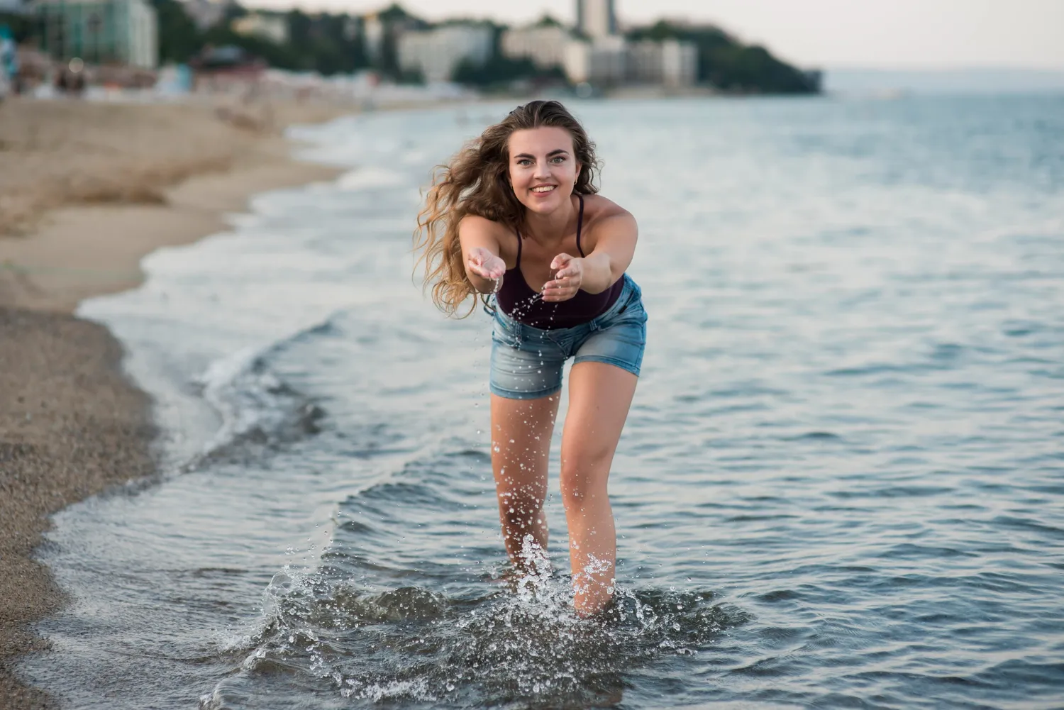 Image 5: Girl stands in the sea