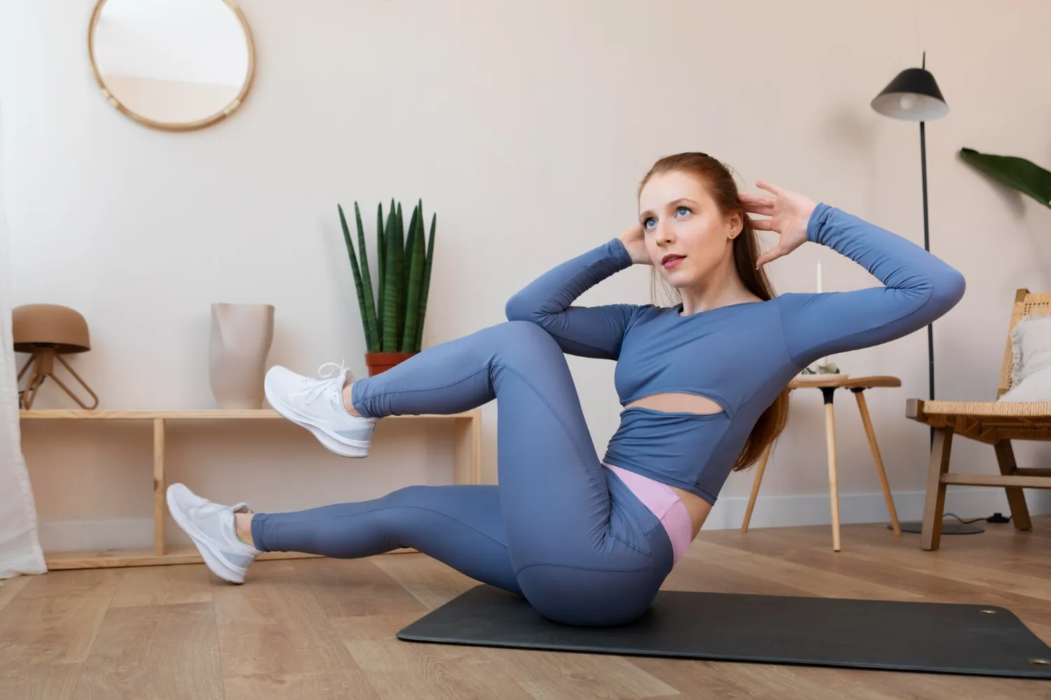 Image 5: A girl doing exercises at home